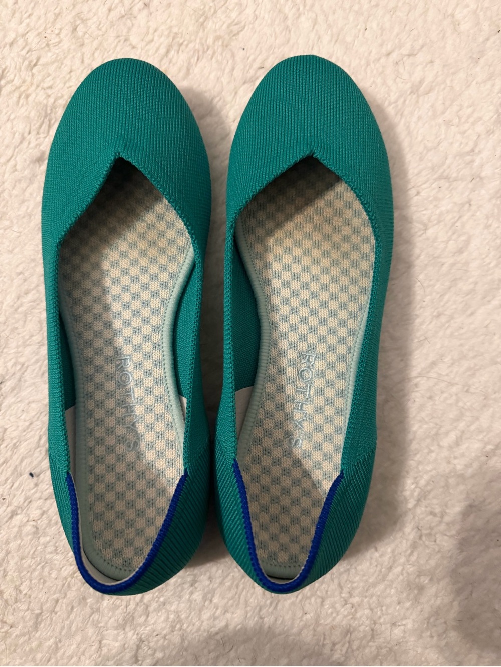 Rothy’s! Adorable green ballet flats.